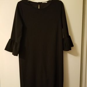 New. Cute black dress with bell sleeves